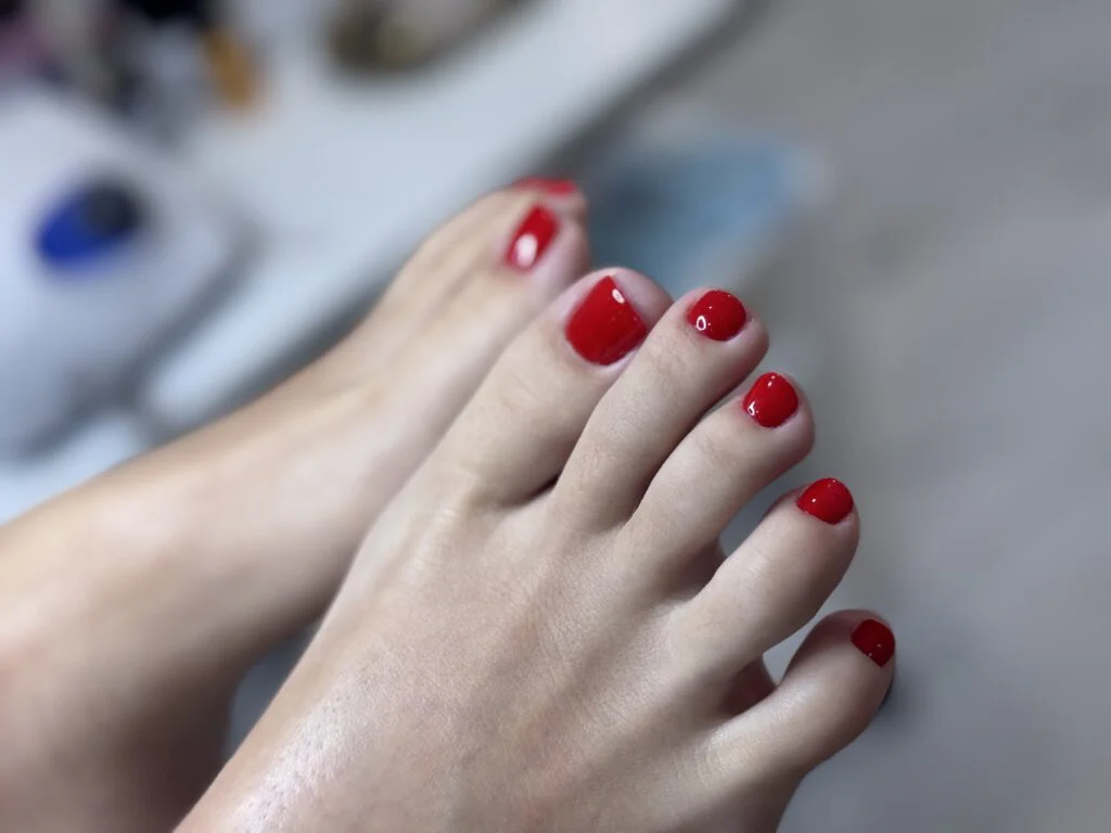 Classic red gel pedicure by Ruta Beauty in Manhattan