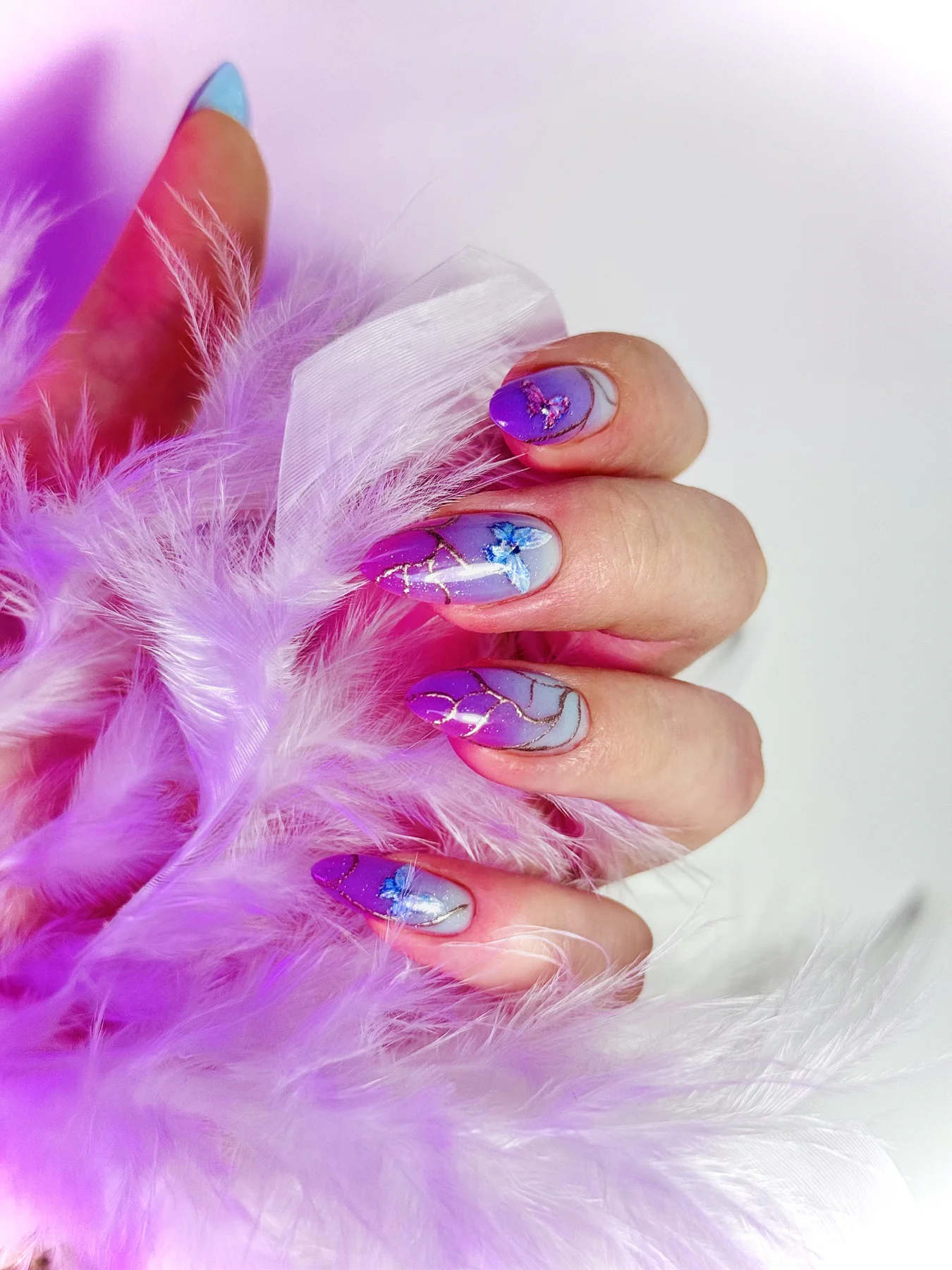 Purple and blue butterfly nail art by Ruta Beauty